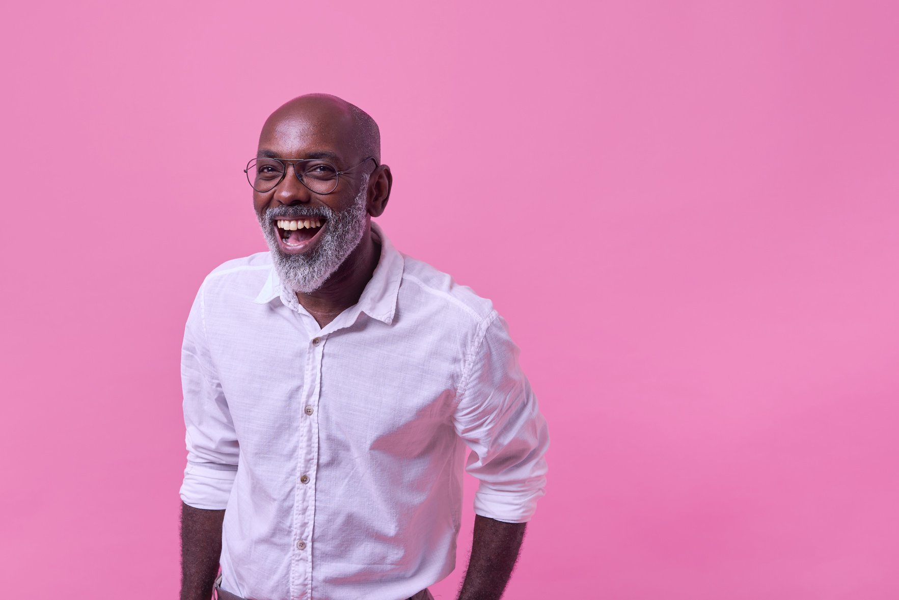 Bold & Punchy Headshots Portrait of Happy Man Copy Space